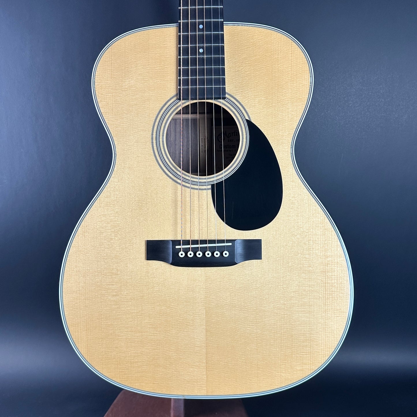 Front of Used Martin OM-28 The Podium 50th Anniversary.