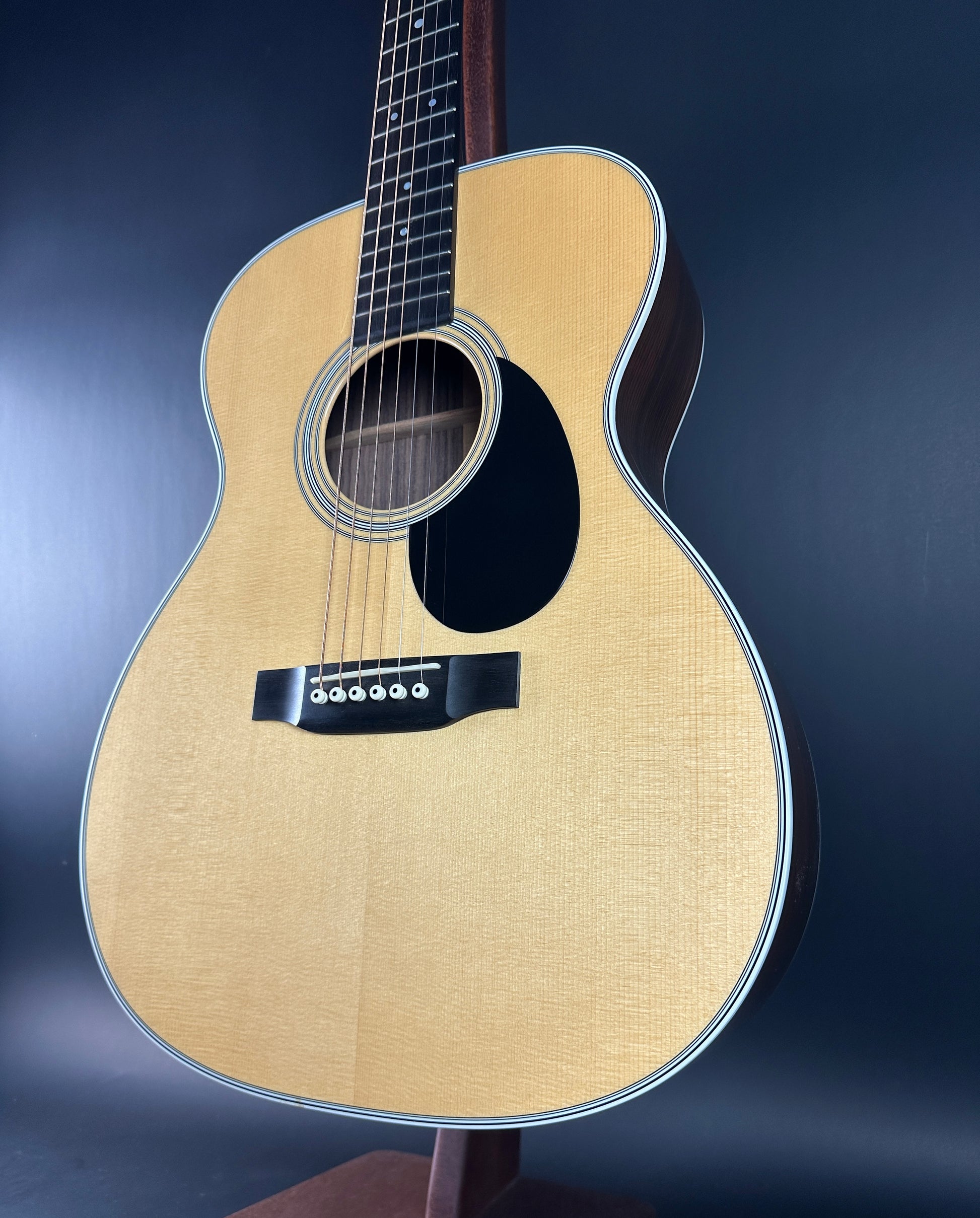 Front angle of Used Martin OM-28 The Podium 50th Anniversary.