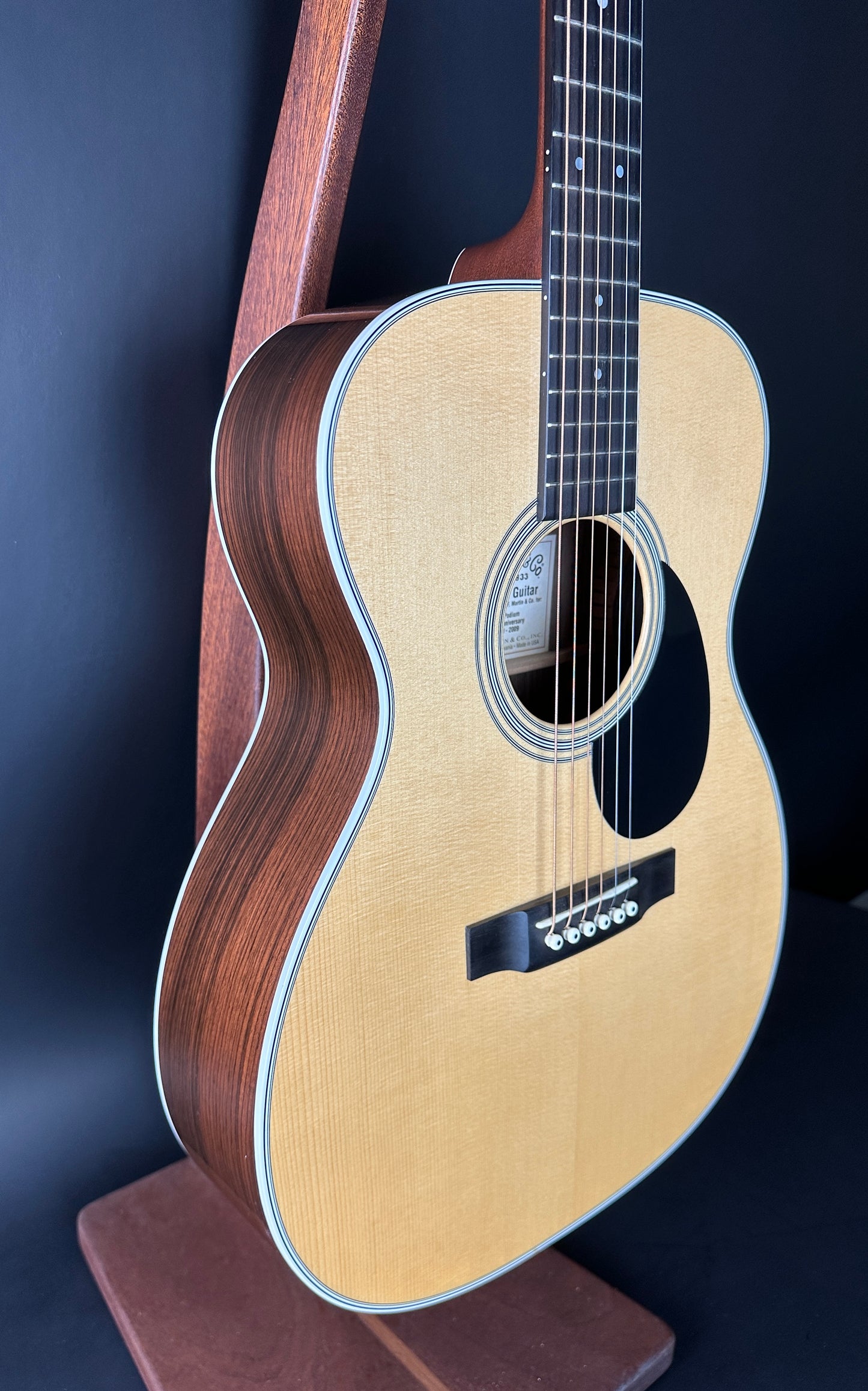 Front angle of Used Martin OM-28 The Podium 50th Anniversary.