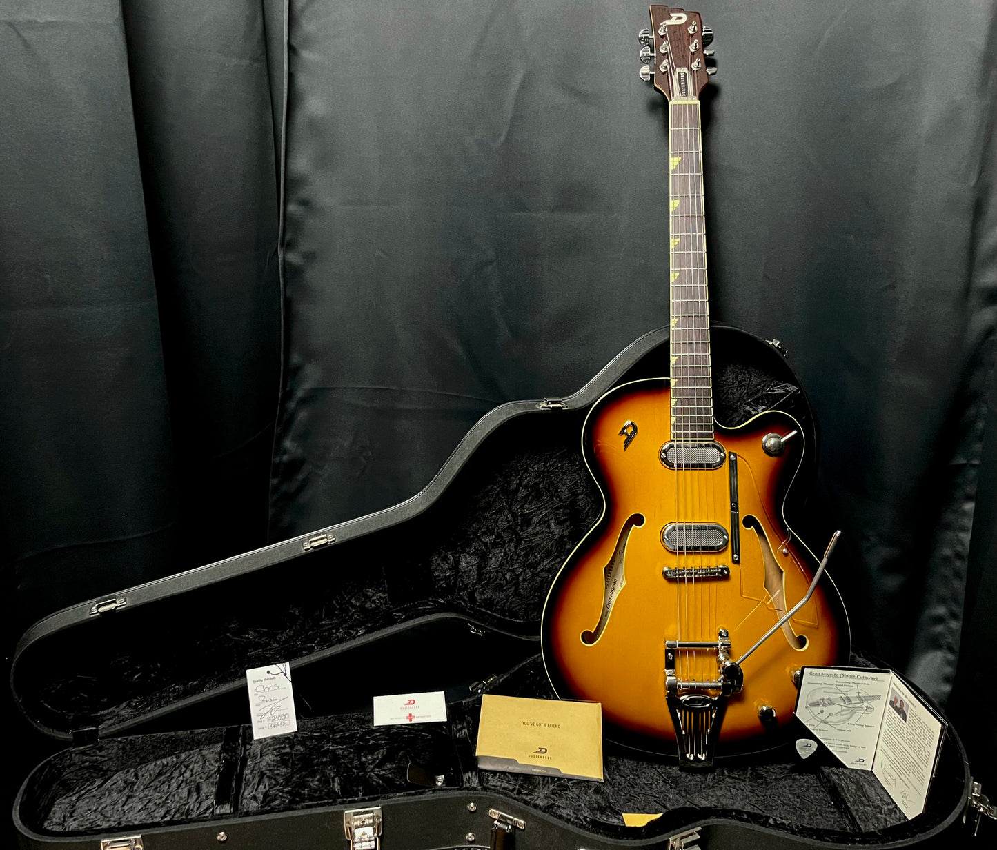 Guitar and case of Used Duesenberg Gran Majesto Single Cut Semi-Hollow Vintage Orange Burst w/case TFW23