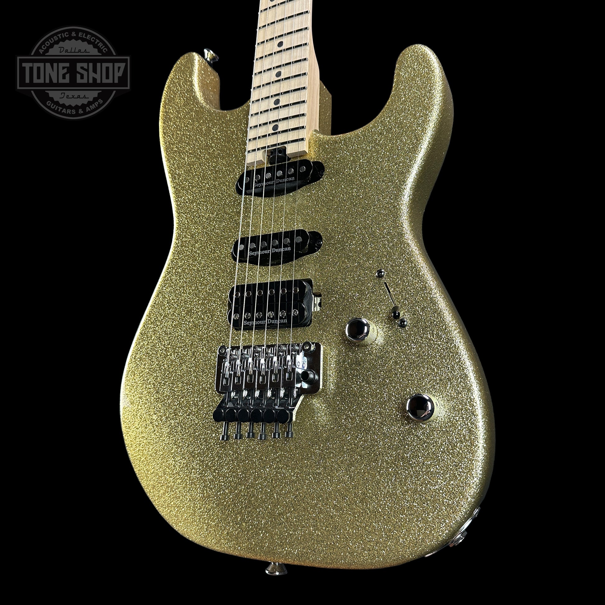 Front angle of Charvel Custom Shop San Dimas HSS Gold Sparkle.