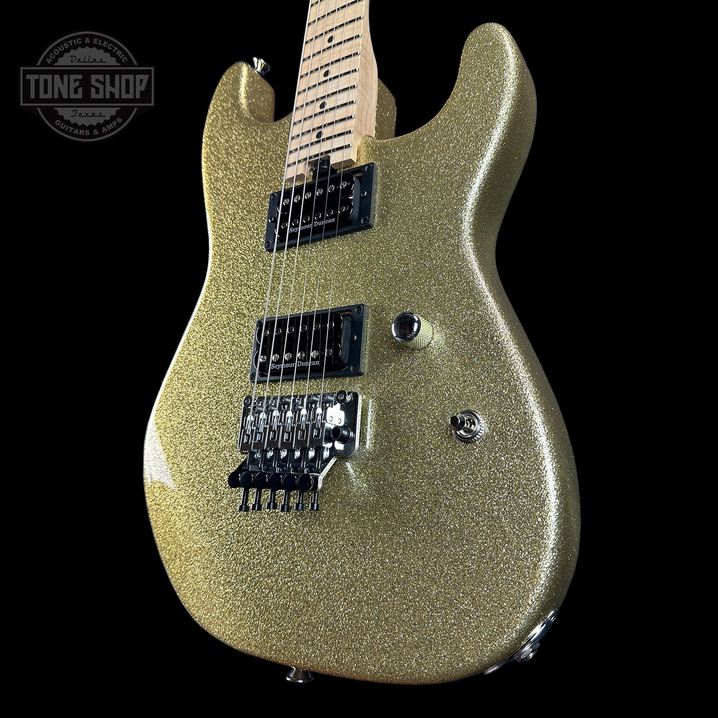 Front angle of Charvel Custom Shop San Dimas 2H FR Gold Sparkle.