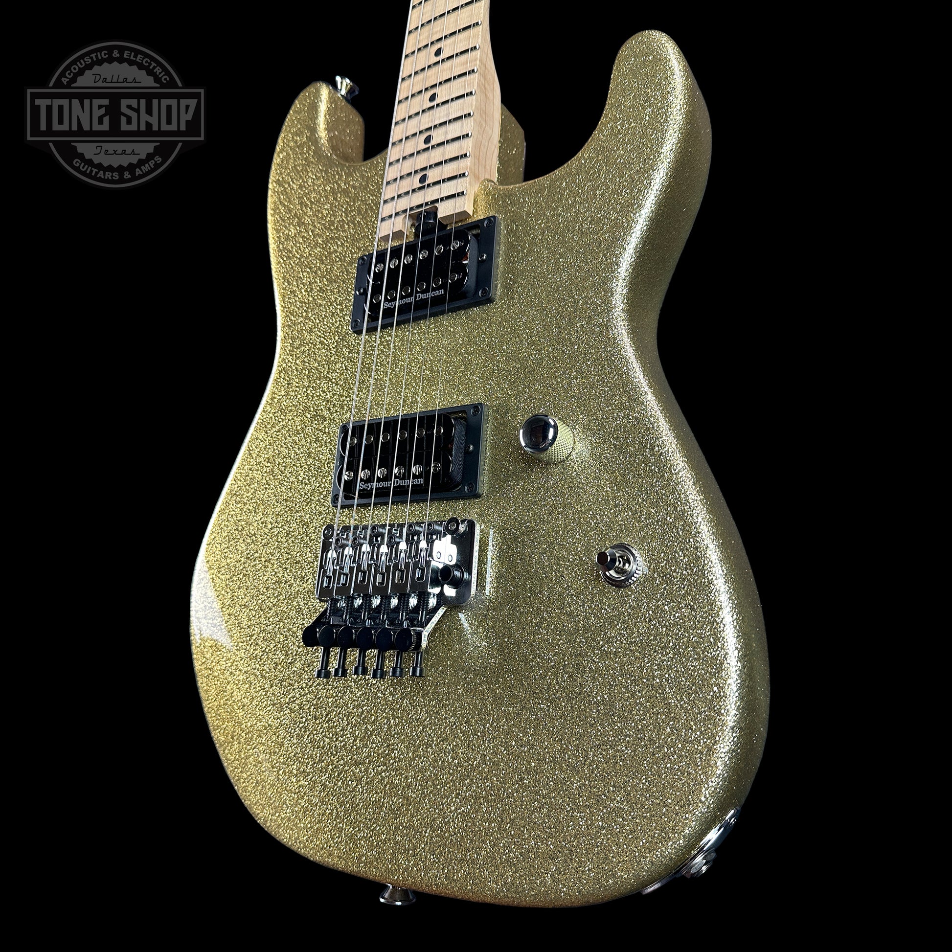 Front angle of Charvel Custom Shop San Dimas 2H FR Gold Sparkle.