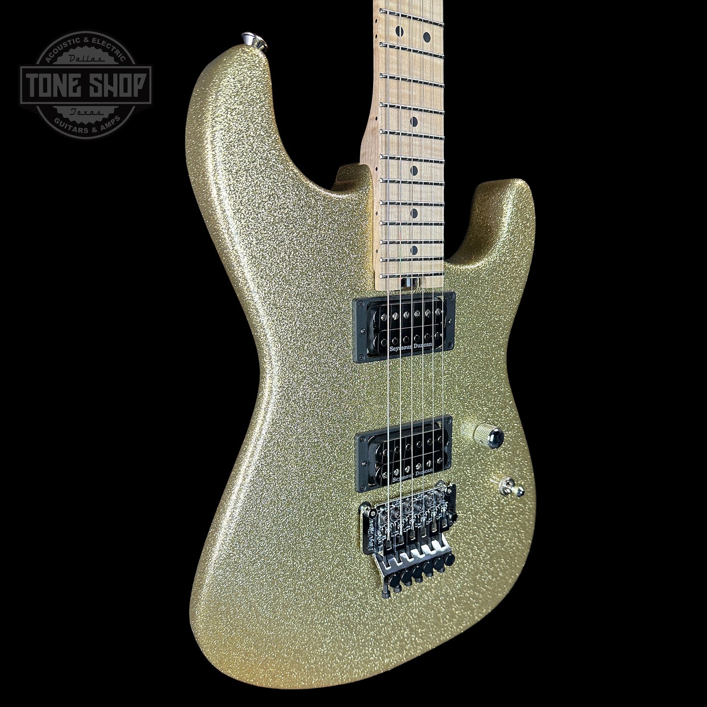 Front angle of Charvel Custom Shop San Dimas 2H FR Gold Sparkle.