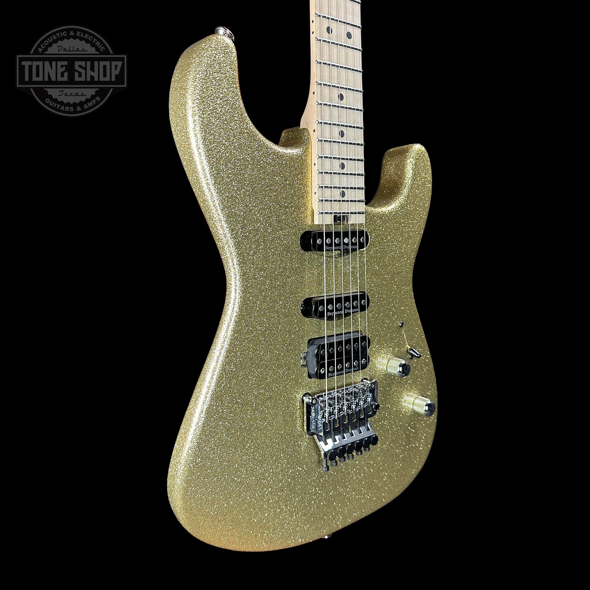 Front angle of Charvel Custom Shop San Dimas HSS Gold Sparkle.