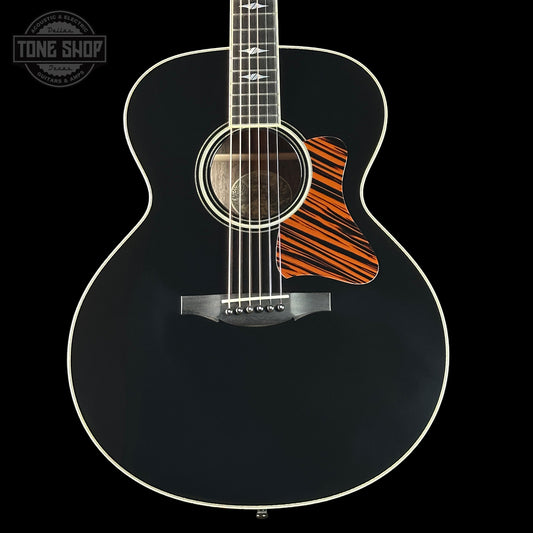 Front of Collings SJ Custom Jet Black Top Tigerstripe Pickguard Old Growth Sitka/Bastogne Walnut.