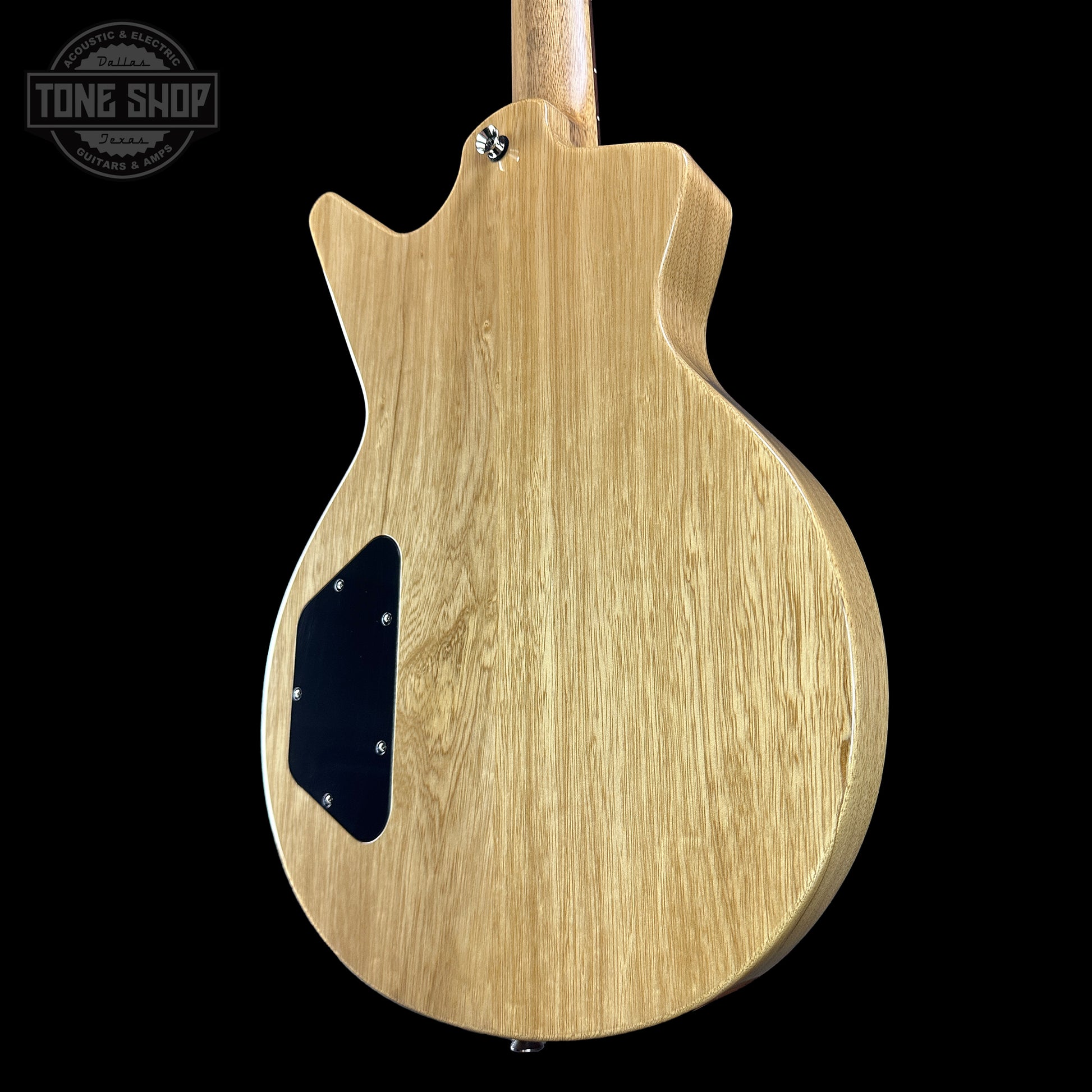 Back angle of Dean USA Custom Shop Cadillac Natural Korina Single Hum.