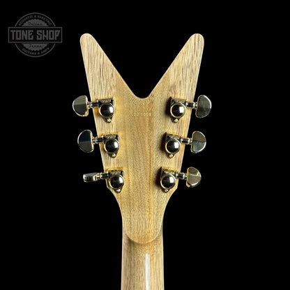 Back of headstock of Dean USA Custom Shop ML Trans Blue Flamed Maple Top Korina Body Gold Hardware.