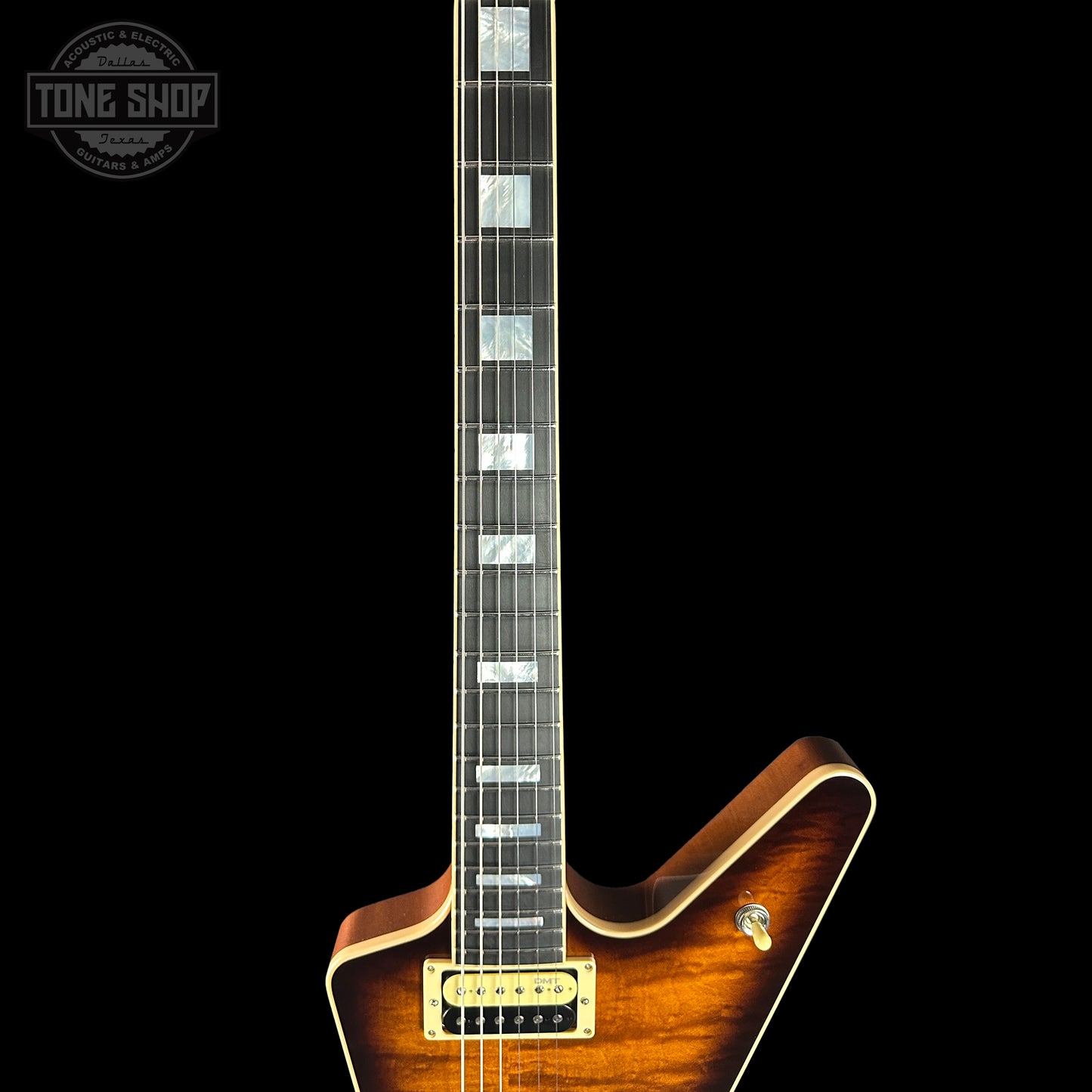 Fretboard of Dean USA Custom Shop ML Custom Quilt Top Trans Tiger Eye.