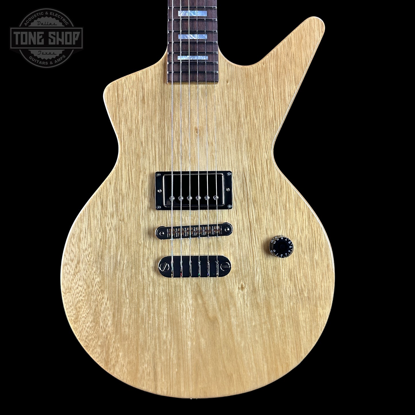 Front of Dean USA Custom Shop Cadillac Natural Korina Single Hum.