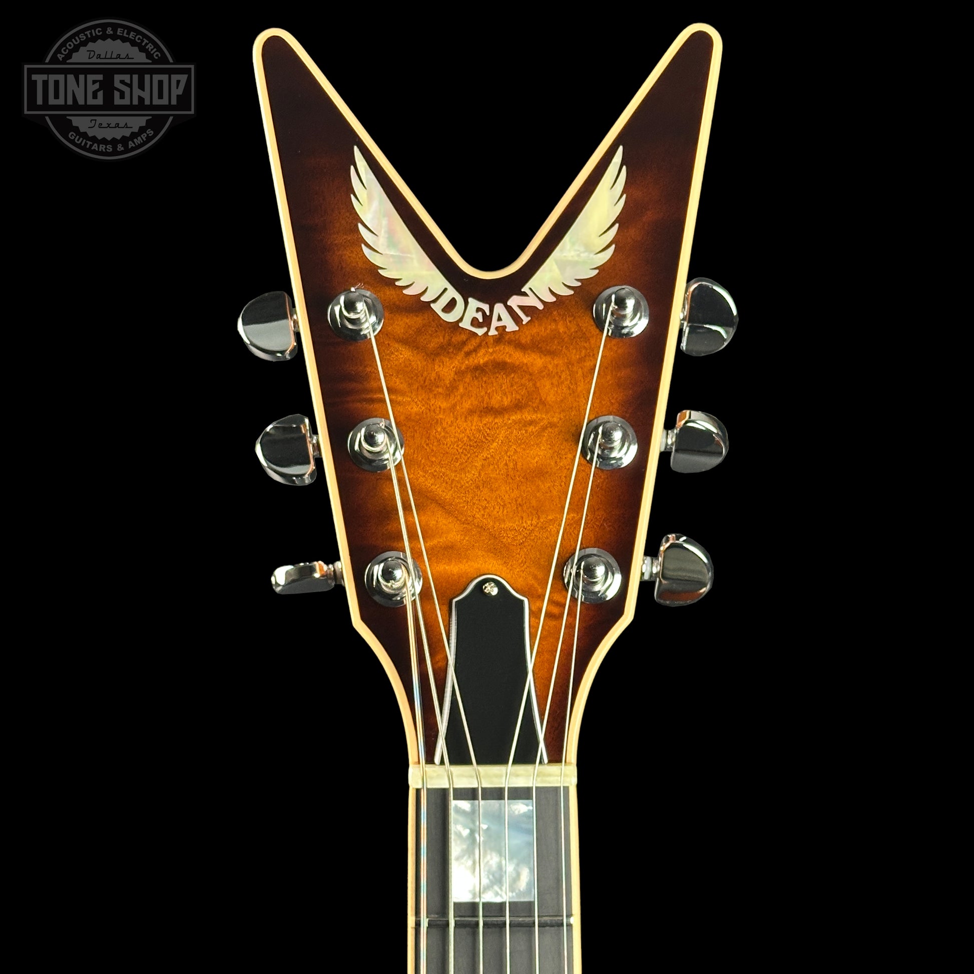 Headstock of Dean USA Custom Shop ML Custom Quilt Top Trans Tiger Eye.