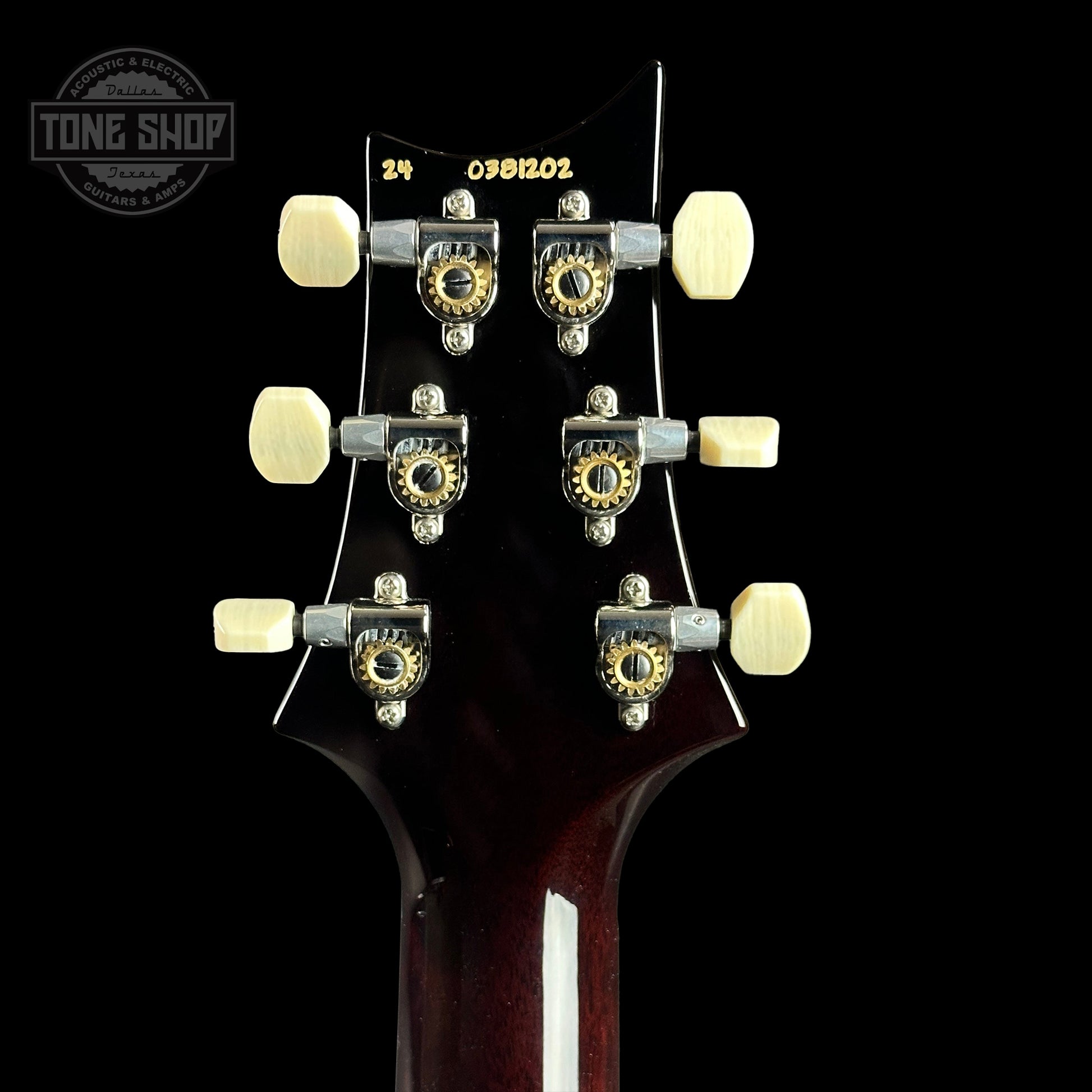 Back of headstock of PRS DGT David Grissom Trem Gold Top w/moons.