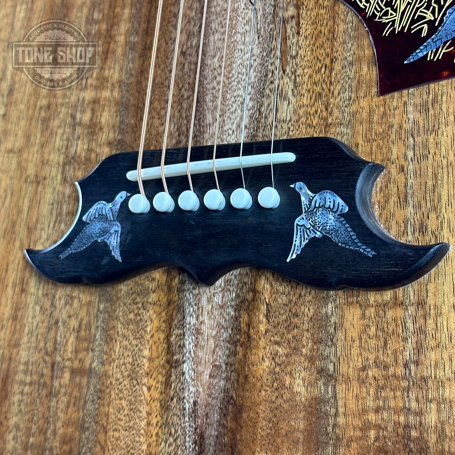 Bridge on Gibson Custom Shop Made 2 Measure All Koa Doves in Flight.