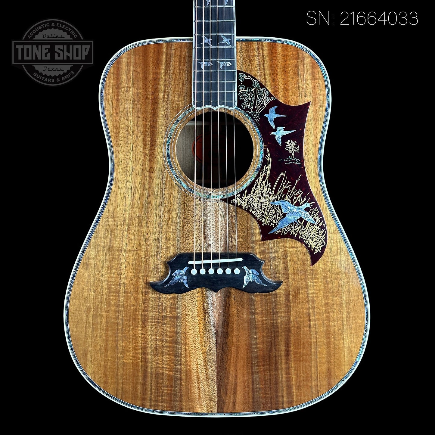 Front of serial number 21664033 of Gibson Custom Shop Made 2 Measure All Koa Doves in Flight.