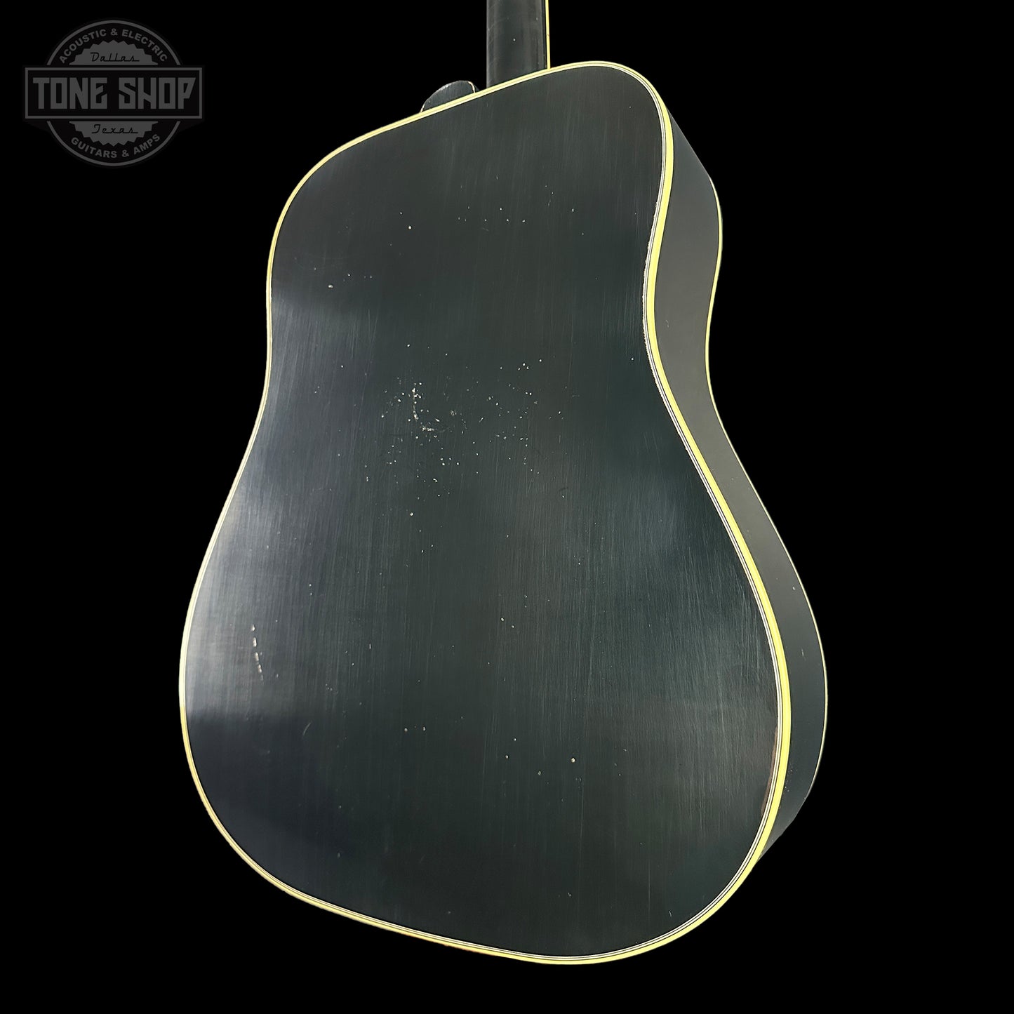 Back angle of Gibson Custom Shop Dealer Select 1960 Hummingbird Ebony Heavy Aged.