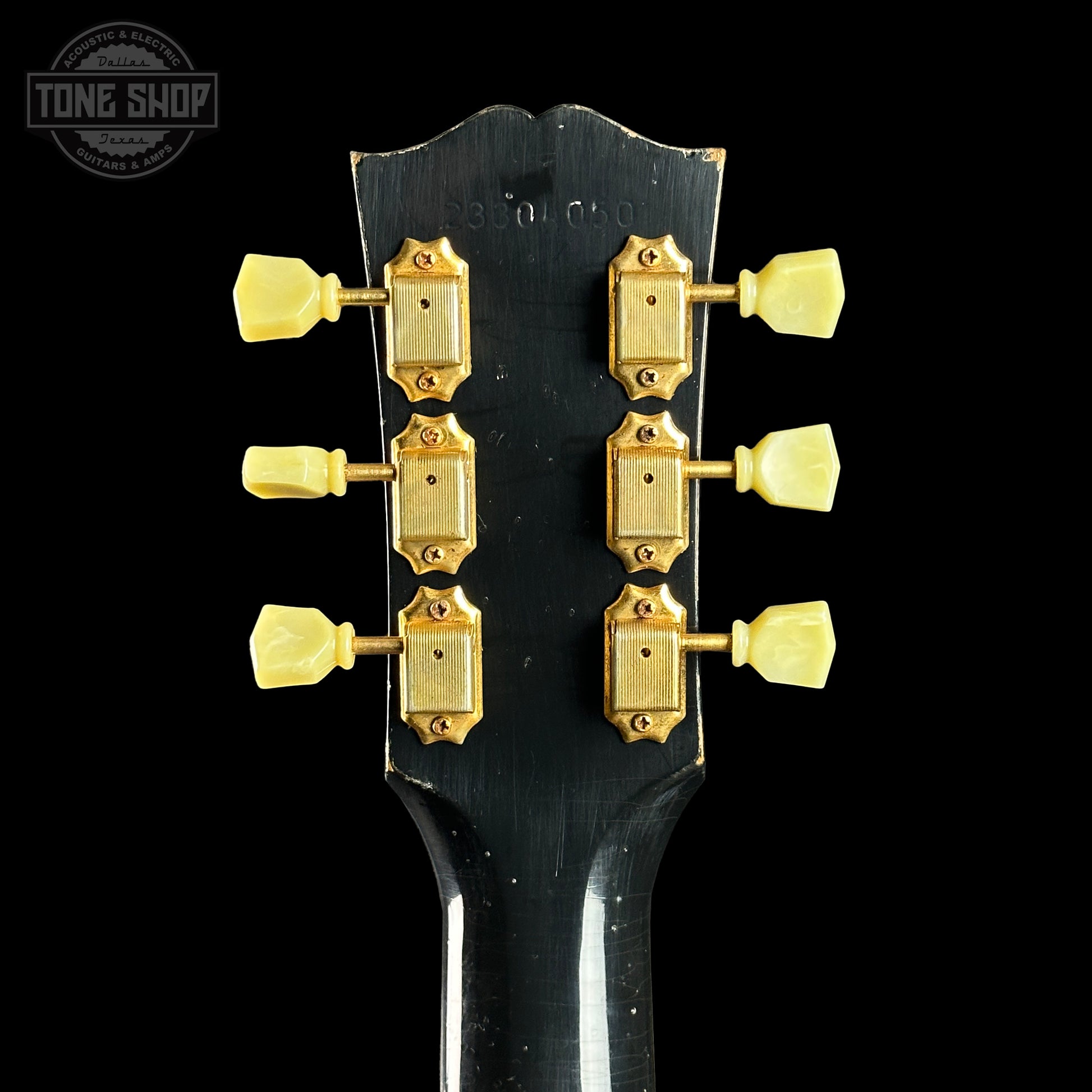 Back of headstock of Gibson Custom Shop Dealer Select 1960 Hummingbird Ebony Heavy Aged.