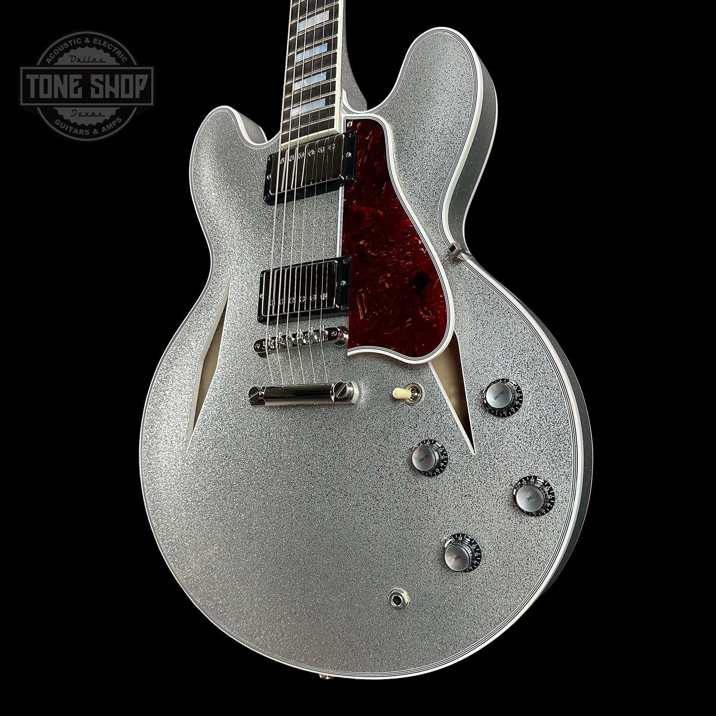 Front angle of Gibson Custom Shop 1959 ES-355 Reissue Diamond F-Holes Silver Sparkle Heavy Flake Gloss.