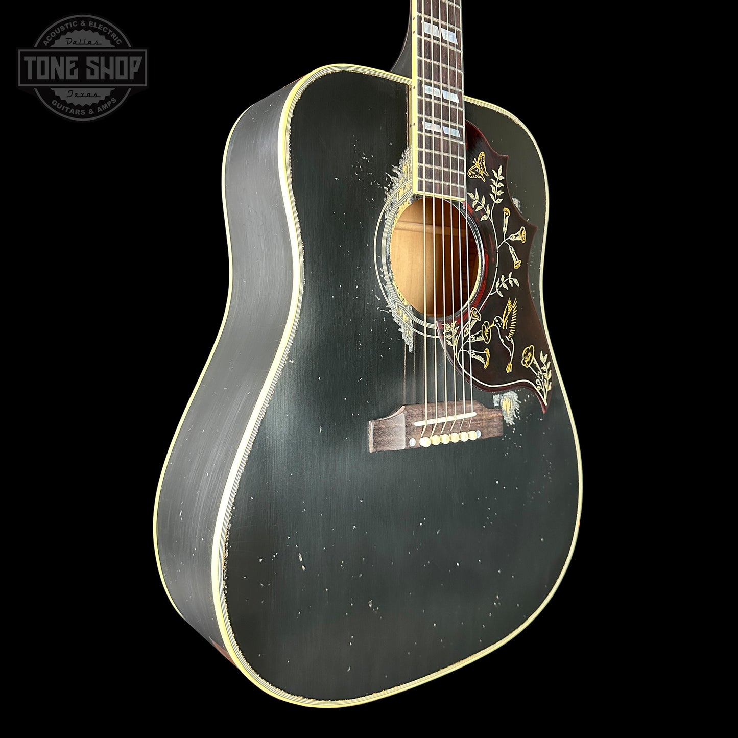 Front angle of Gibson Custom Shop Dealer Select 1960 Hummingbird Ebony Heavy Aged.