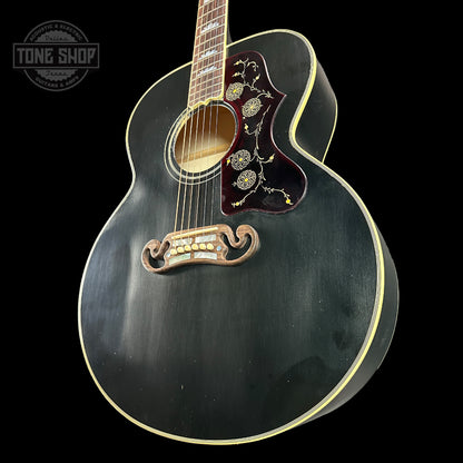 Front angle of Gibson Custom Shop M2M 1957 SJ-200 Murphy Lab Light Aged  Ebony.