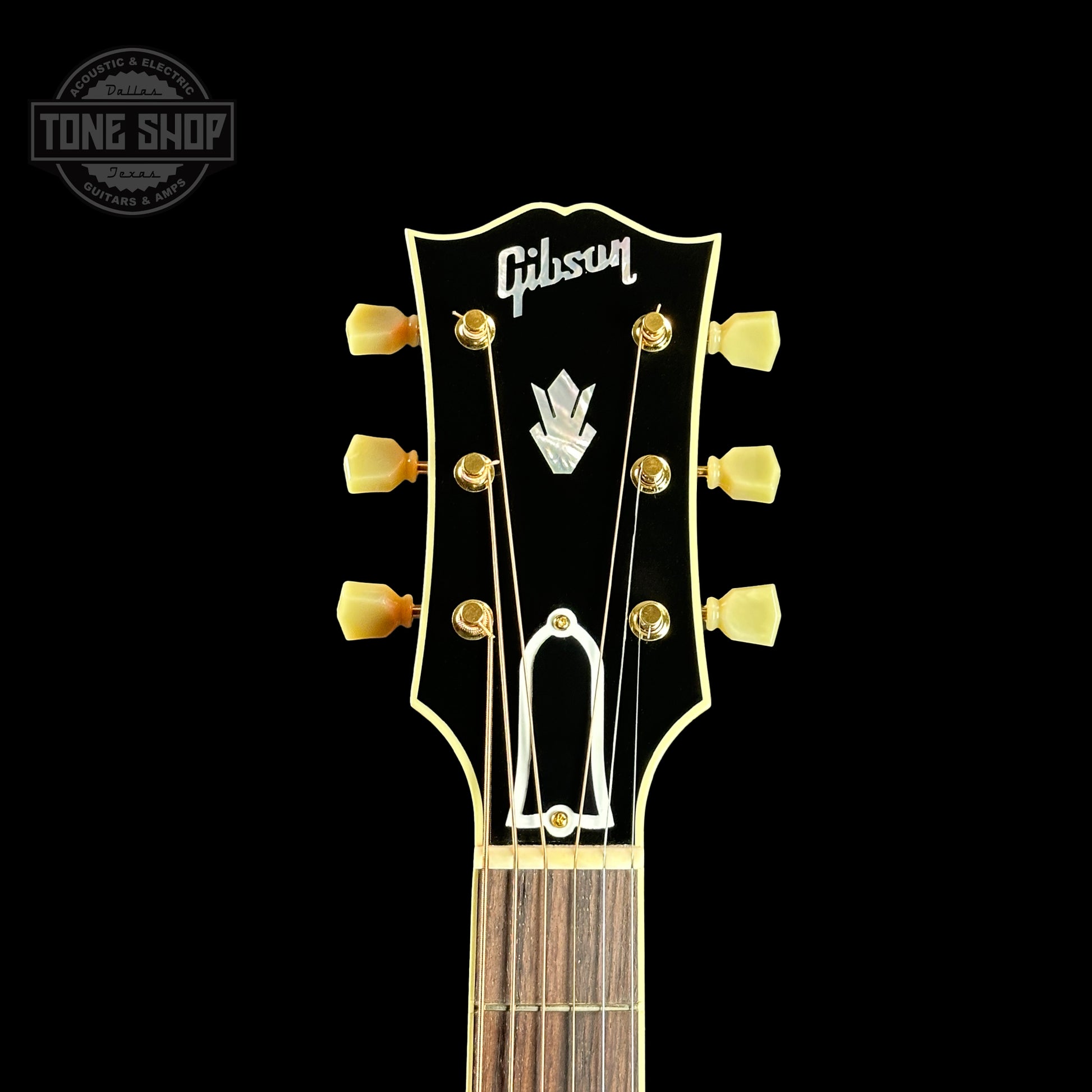 Front of headstock of Gibson Custom Shop Johnny Cash SJ-200 Vintage Cherry Sunburst.