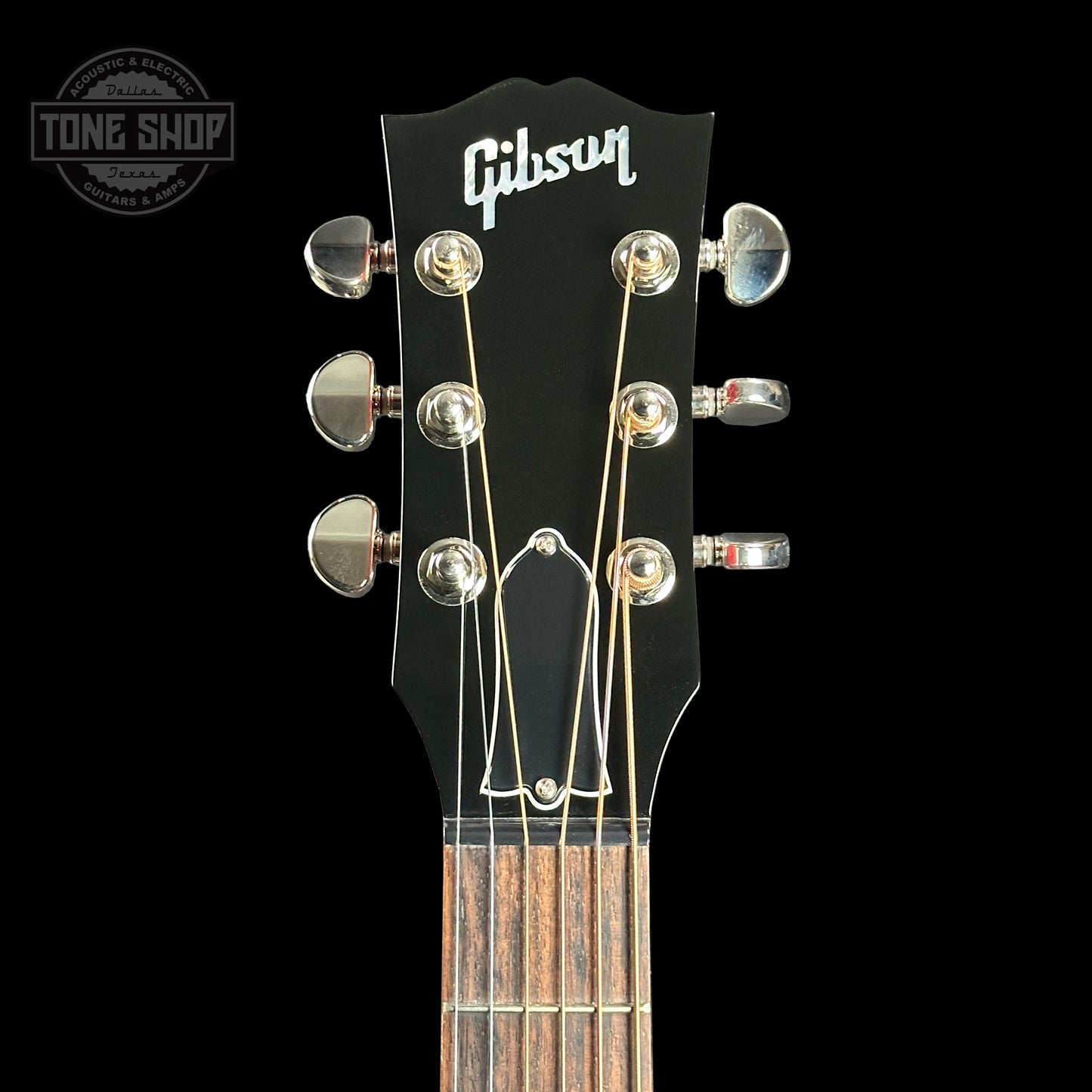 Front of headstock of Gibson J-45 Standard Left Handed Cherry.