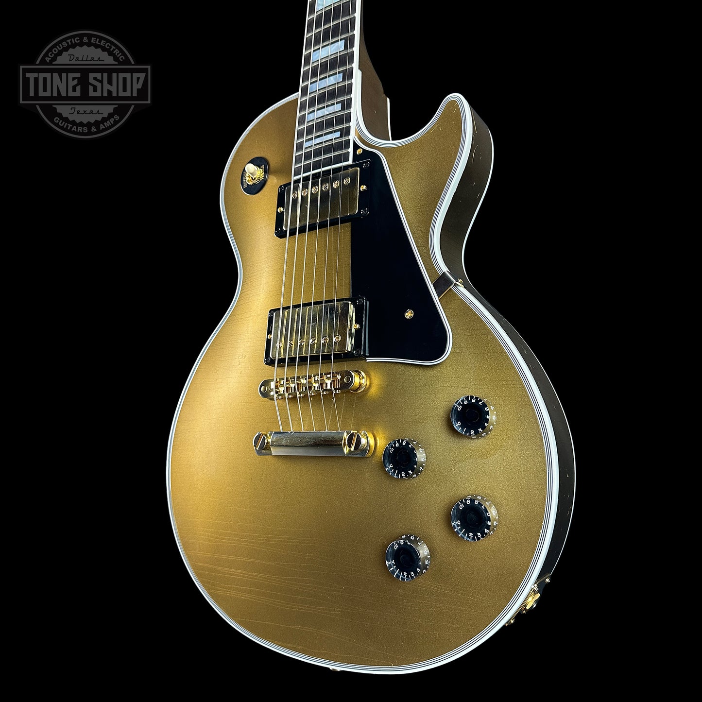 Front angle of Gibson Custom Shop Made 2 Measure Les Paul Custom Chambered Double Gold.