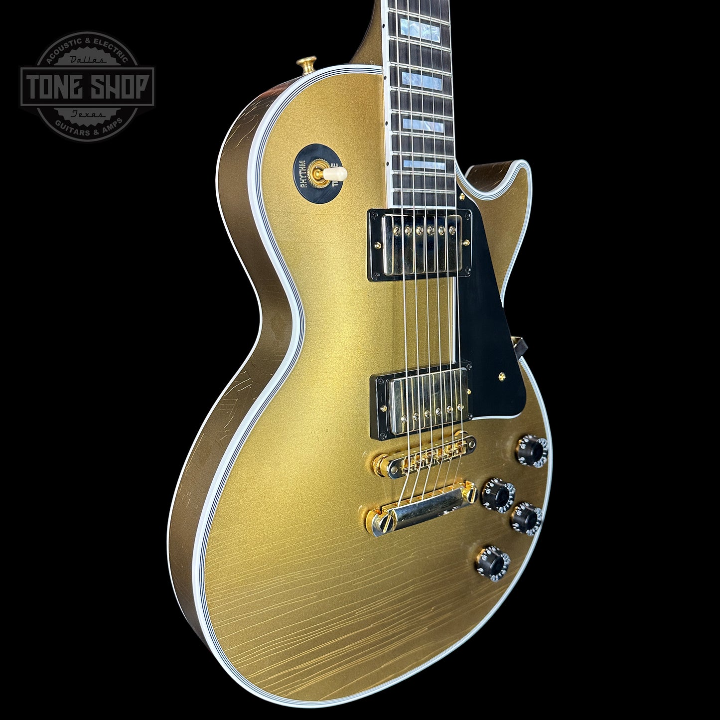 Front angle of Gibson Custom Shop Made 2 Measure Les Paul Custom Chambered Double Gold.