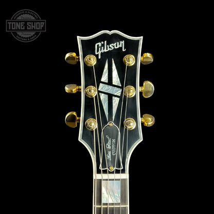 Front of headstock of Gibson Custom Shop Made 2 Measure Les Paul Custom Chambered Double Gold.