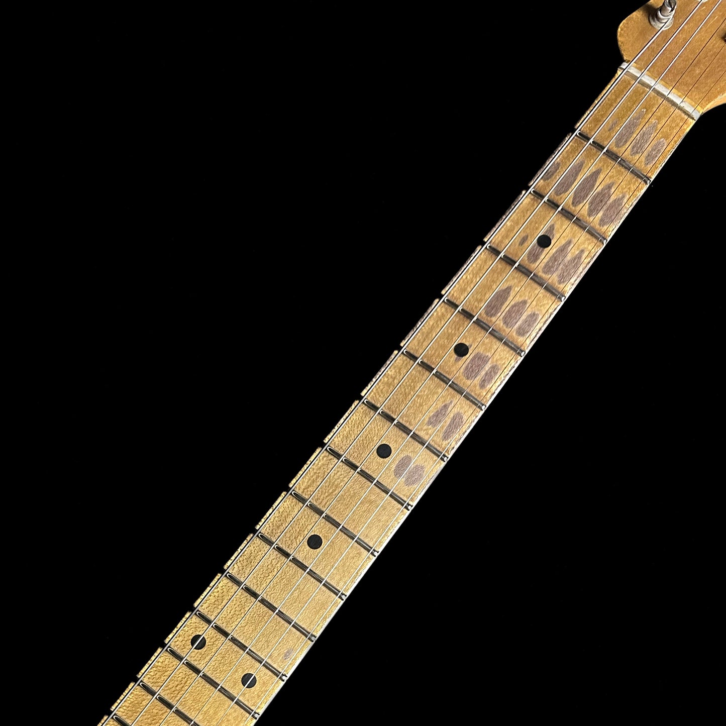 Fretboard of Fender Custom Shop Limited Edition '57 Stratocaster Relic Wide Fade 2 Color Sunburst.
