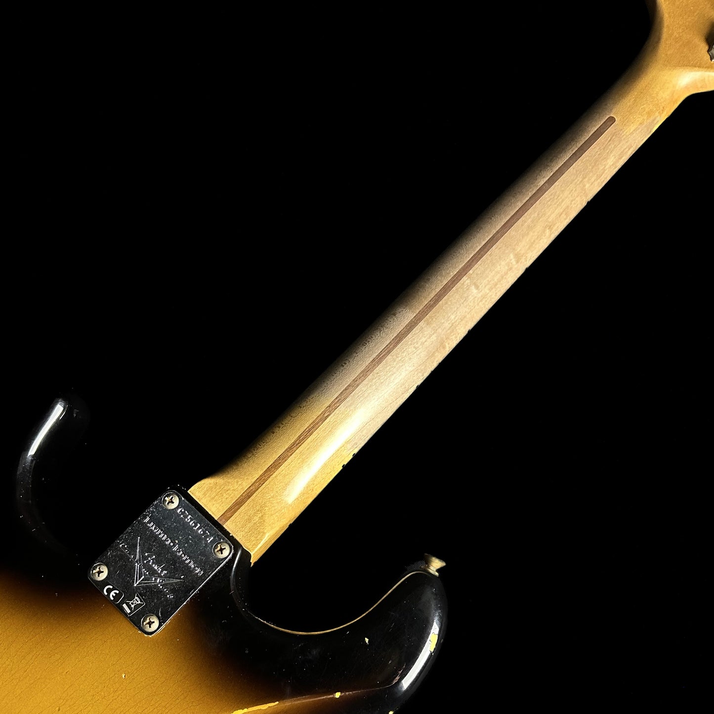 Back of neck of Fender Custom Shop Limited Edition '57 Stratocaster Relic Wide Fade 2 Color Sunburst.