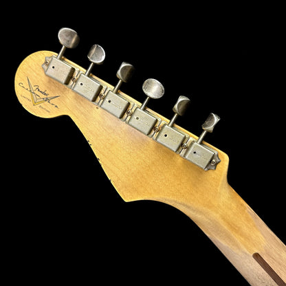 Back of headstock of Fender Custom Shop Limited Edition '57 Stratocaster Relic Wide Fade 2 Color Sunburst.