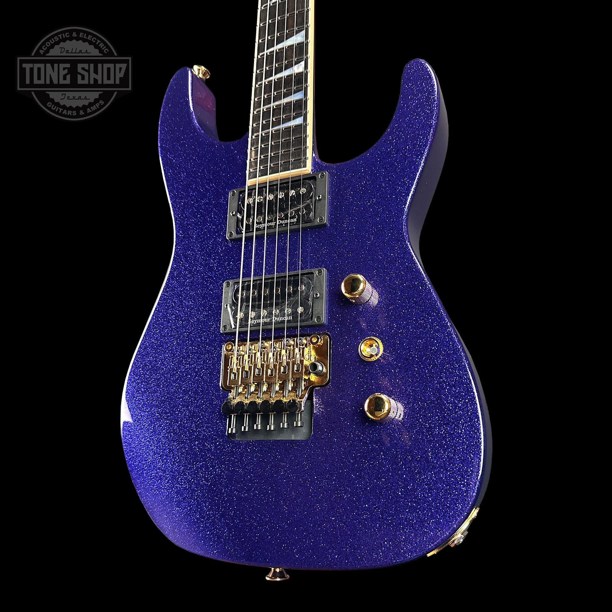 Front angle of Jackson Custom Shop SL2H Purple Sparkle.