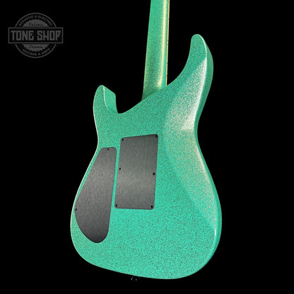 Back angle of Jackson Custom Shop SL1 Soloist RVRS FR Seafoam Sparkle.