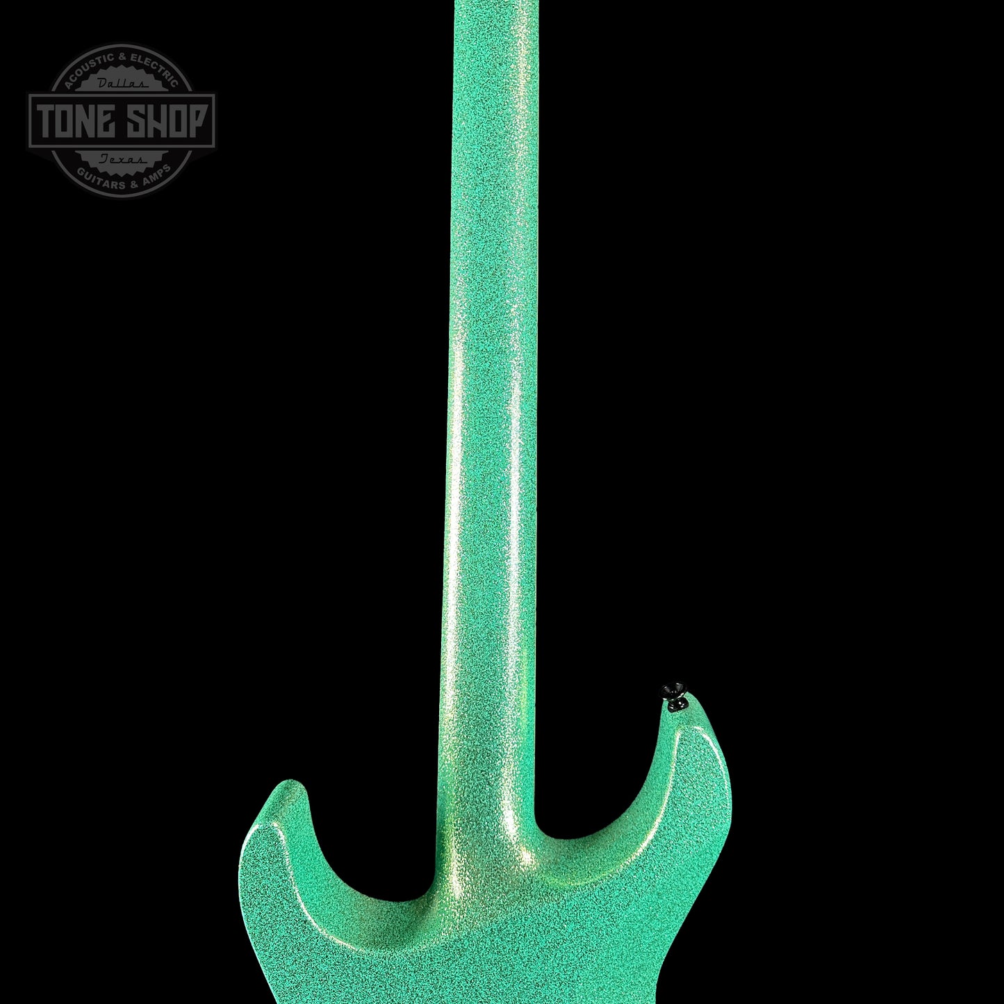 Back of neck of Jackson Custom Shop SL1 Soloist RVRS FR Seafoam Sparkle.