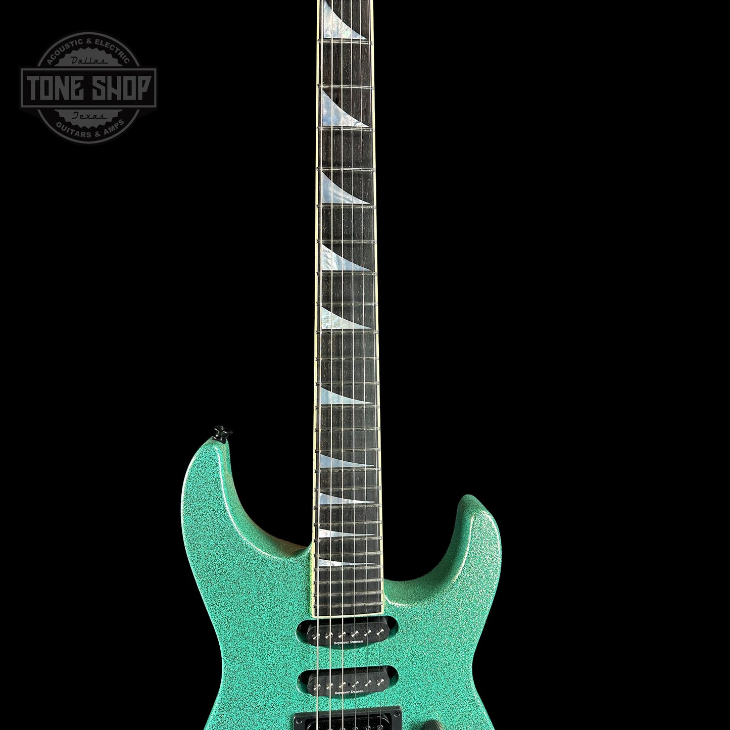 Fretboard of Jackson Custom Shop SL1 Soloist RVRS FR Seafoam Sparkle.