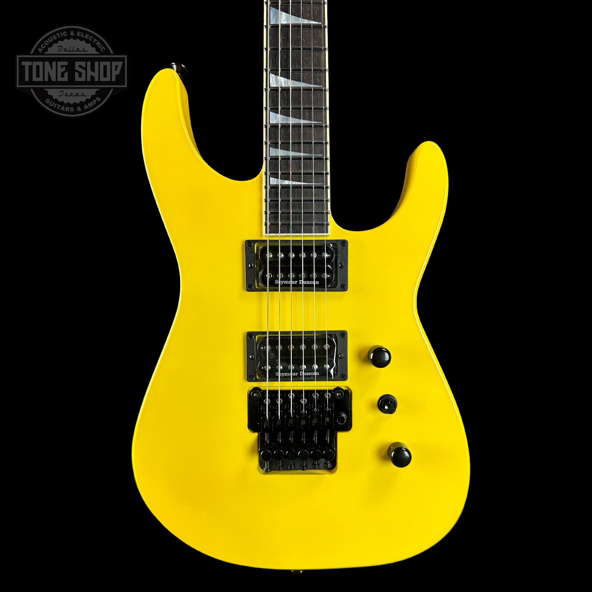 Front of Jackson Custom Shop SL2H Reverse Headstock Grafitti Yellow.