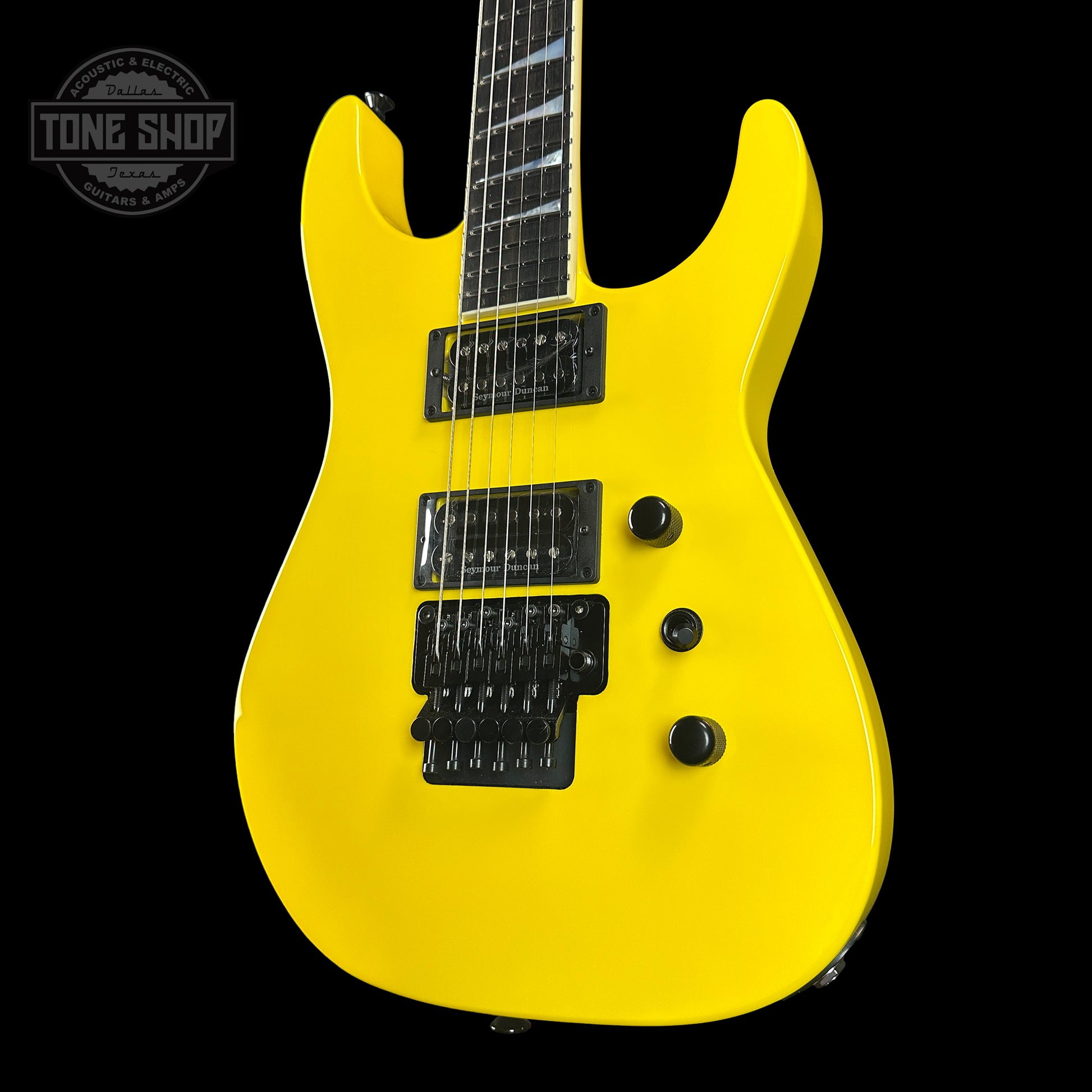 Front angle of Jackson Custom Shop SL2H Grafitti Yellow.