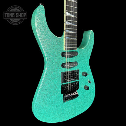 Front angle of Jackson Custom Shop SL1 Soloist RVRS FR Seafoam Sparkle.