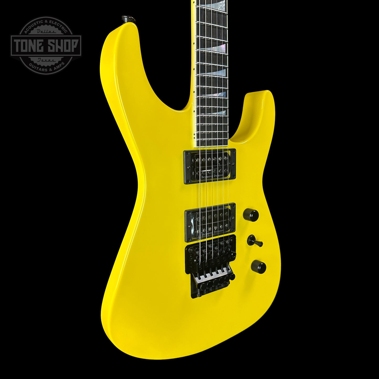 Front angle of Jackson Custom Shop SL2H Grafitti Yellow.