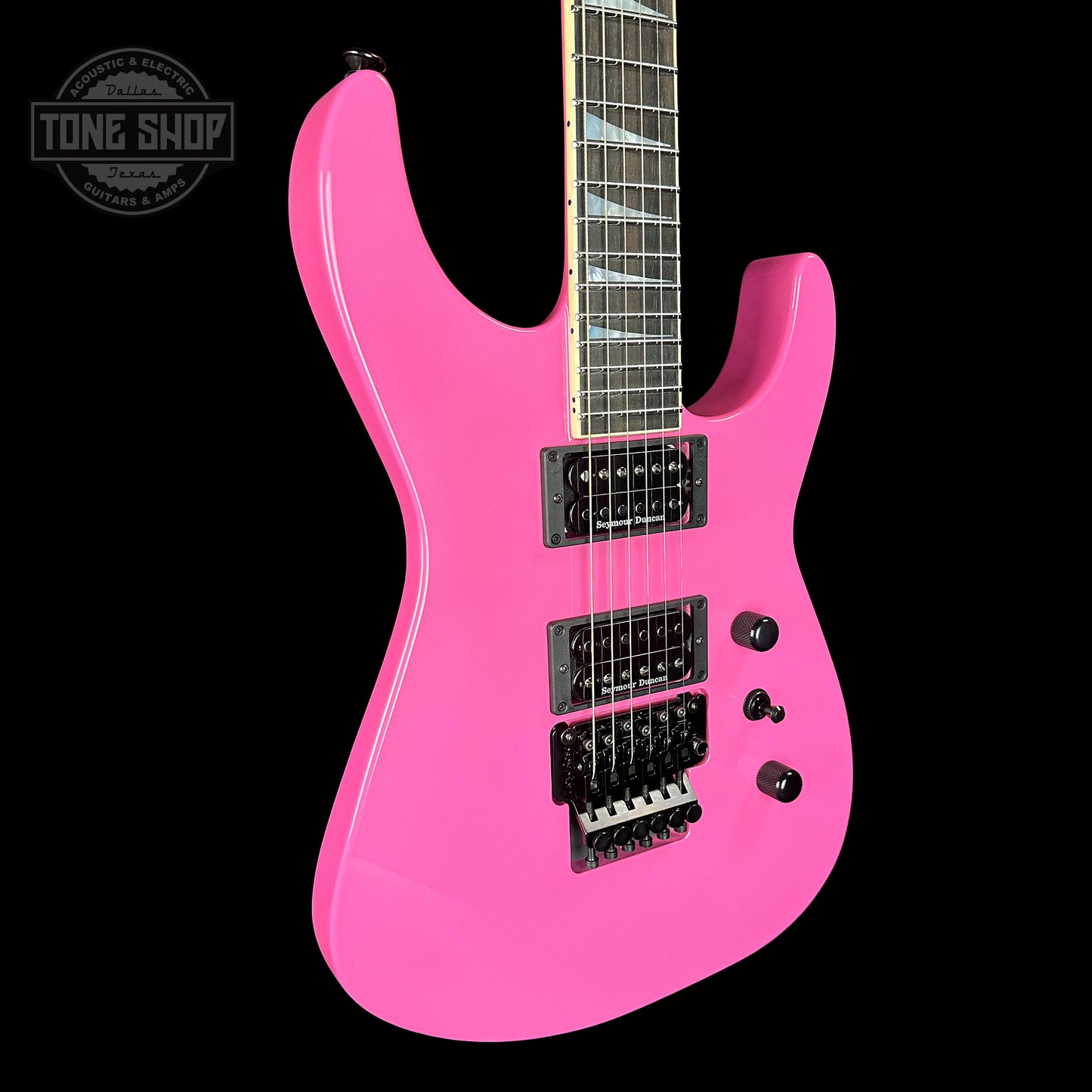 Front angle of Jackson Custom Shop SL2H Reverse Headstock Bubblegum.