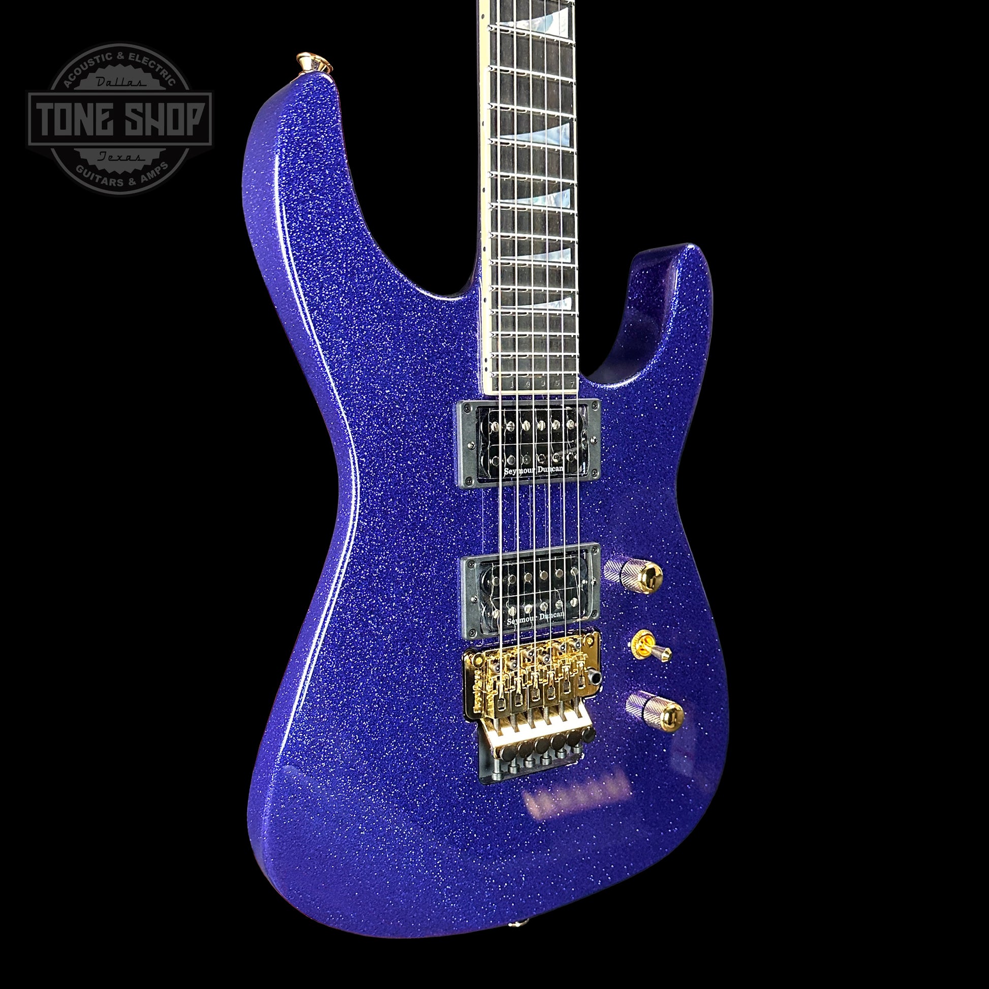 Front angle of Jackson Custom Shop SL2H Purple Sparkle.