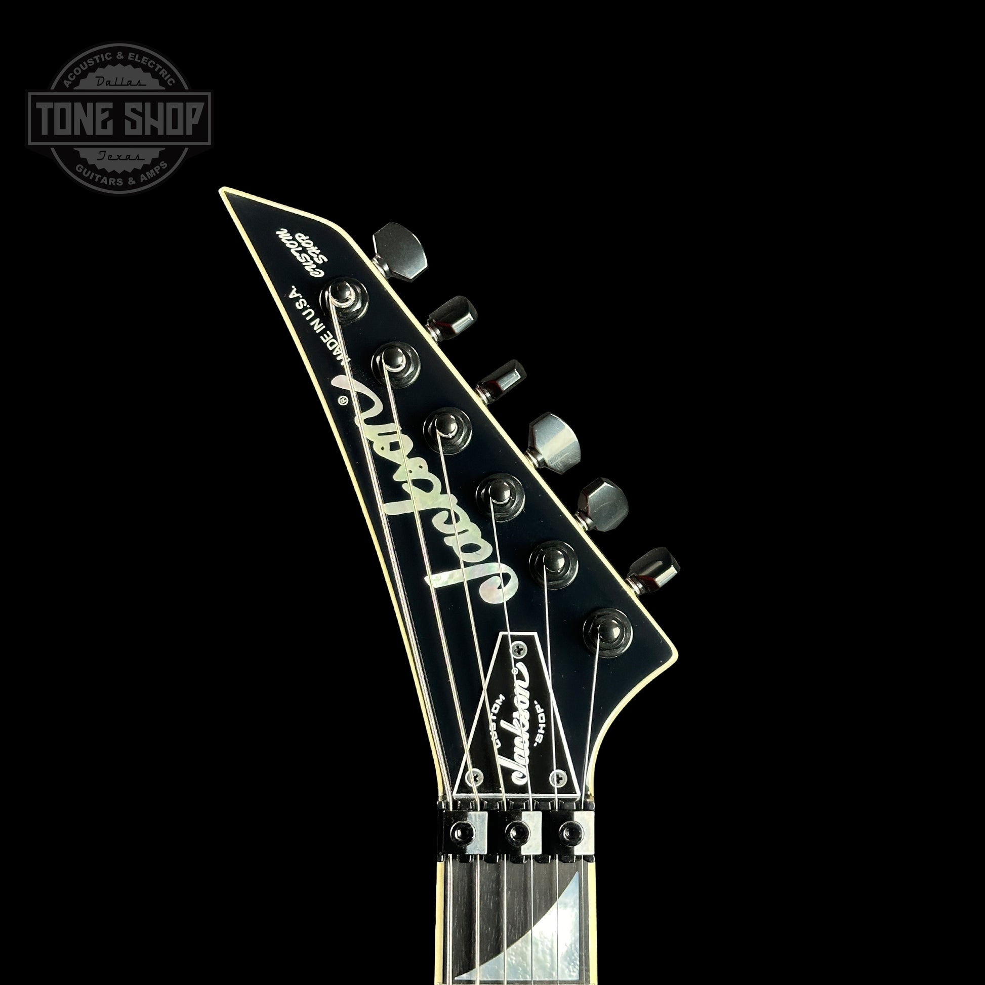 Front of headstock of Jackson Custom Shop SL2H Ferrari Red.