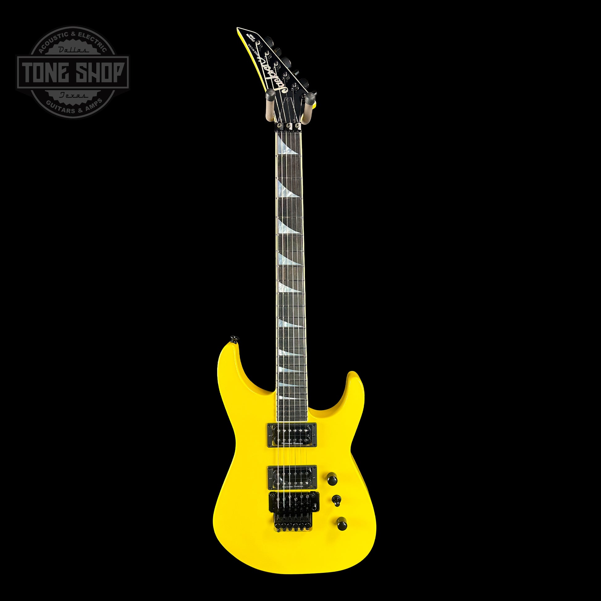 Full front of Jackson Custom Shop SL2H Reverse Headstock Grafitti Yellow.