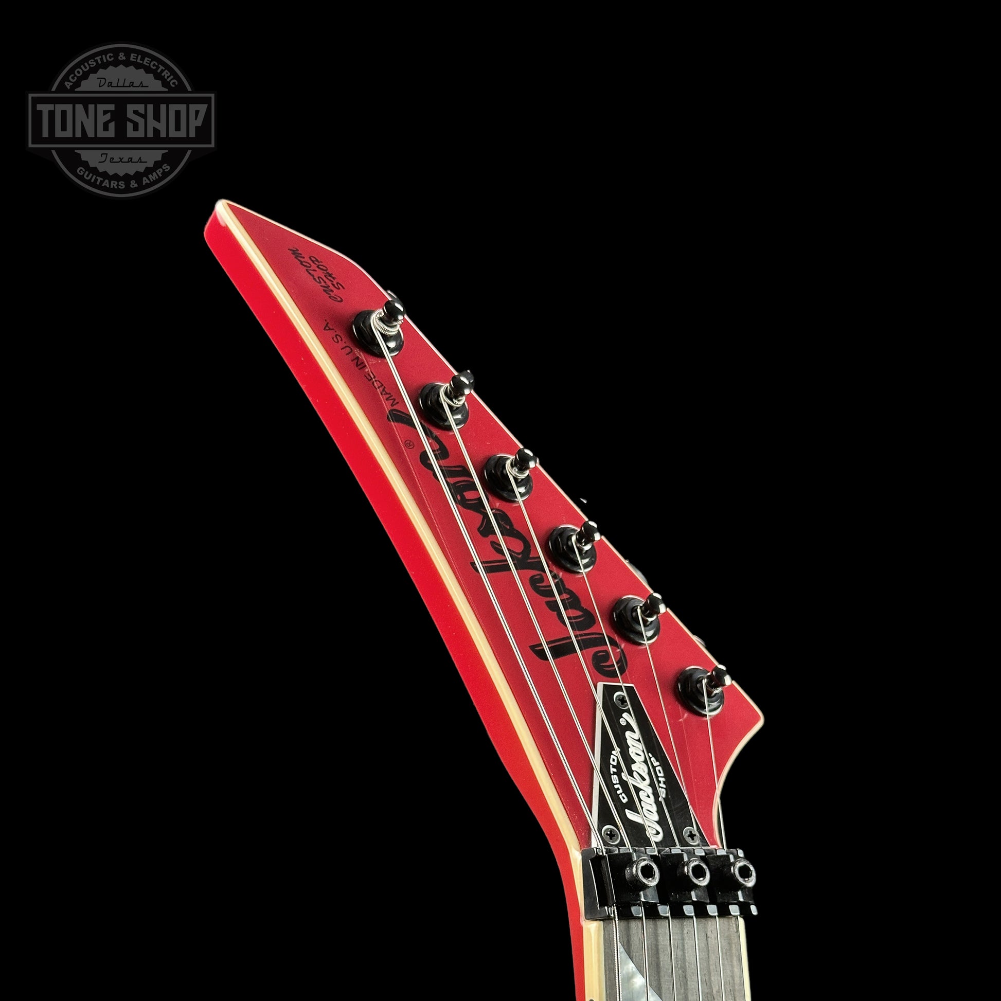 Front of headstock of Jackson Custom Shop SL2H Reverse Headstock Dakota Red.