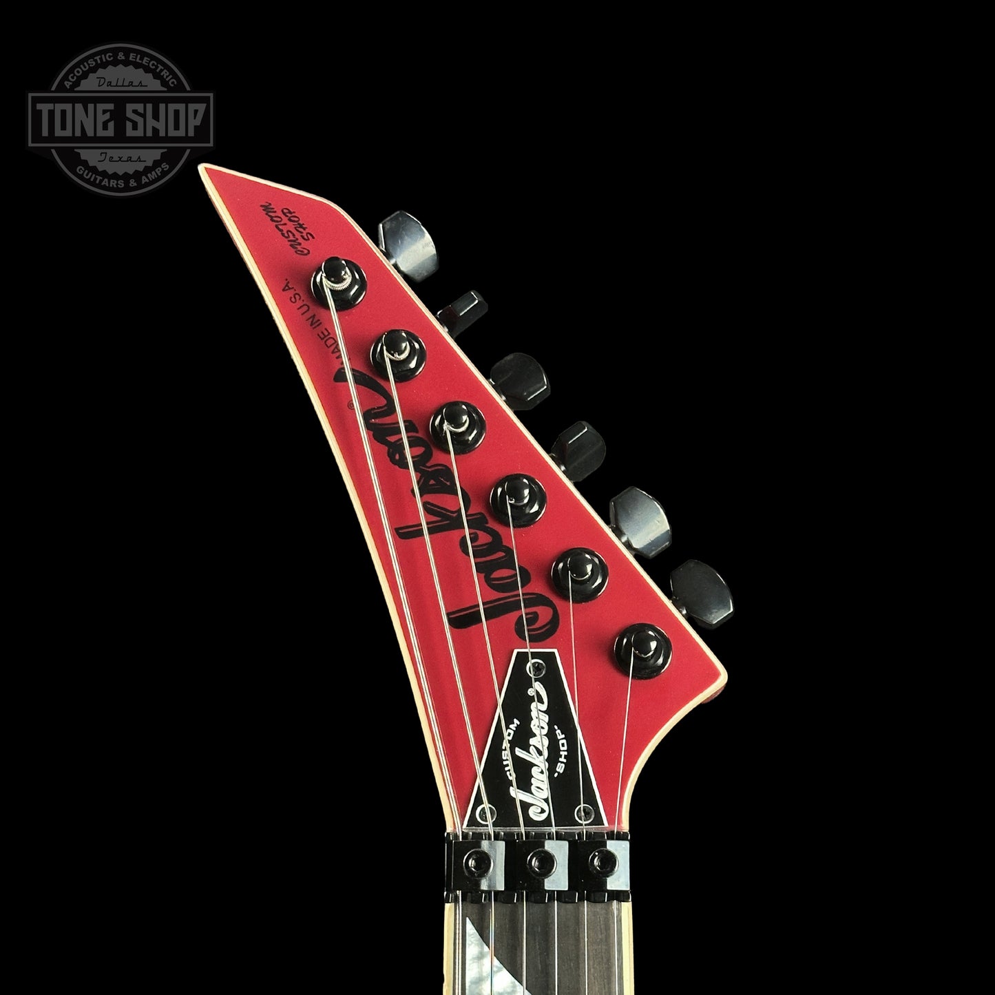 Front of headstock of Jackson Custom Shop SL2H Reverse Headstock Dakota Red.