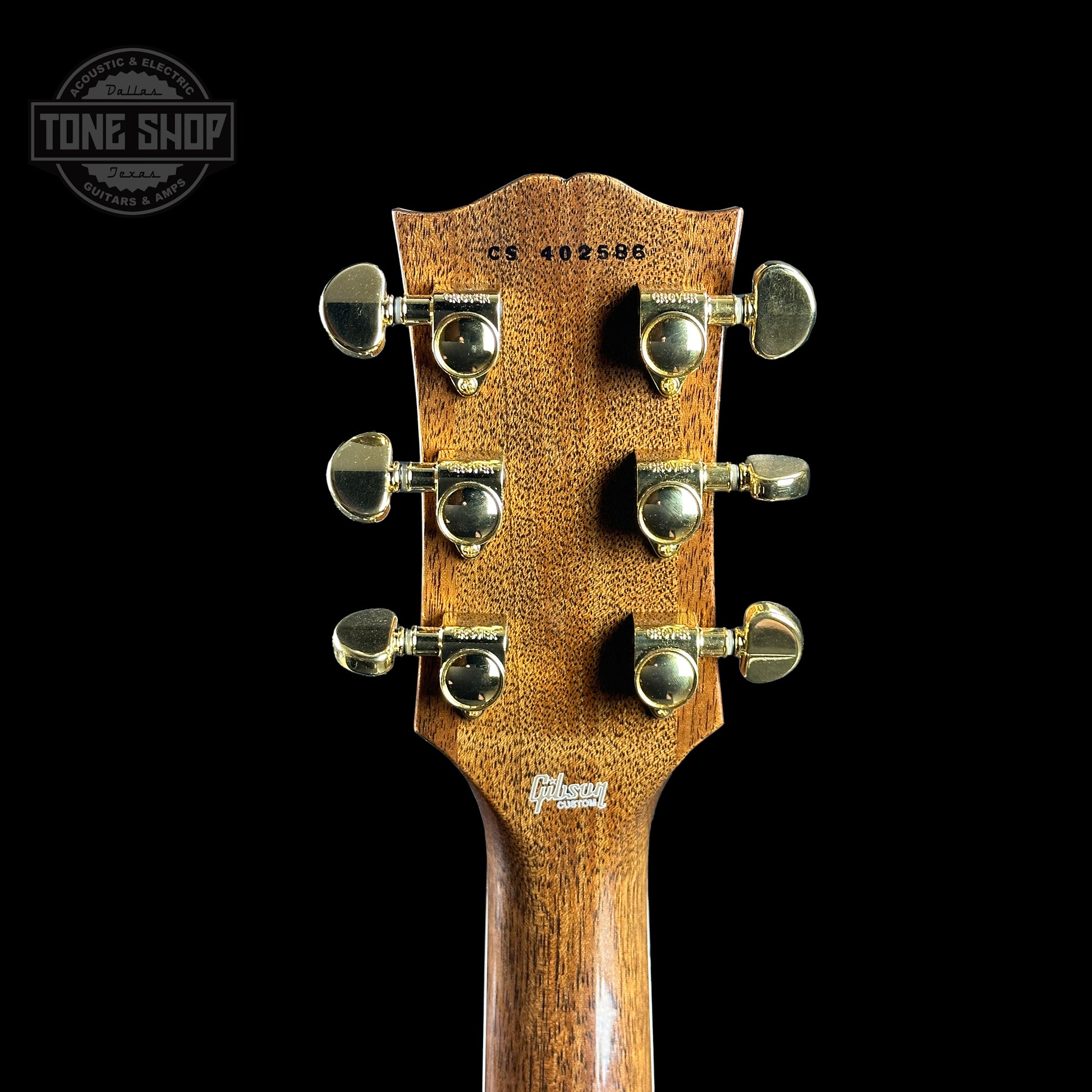 Back of headstock of Gibson Custom Shop Made 2 Measure Les Paul Custom Chambered Koa Gloss.