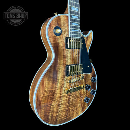 Front angle of Gibson Custom Shop Made 2 Measure Les Paul Custom Chambered Koa Gloss.