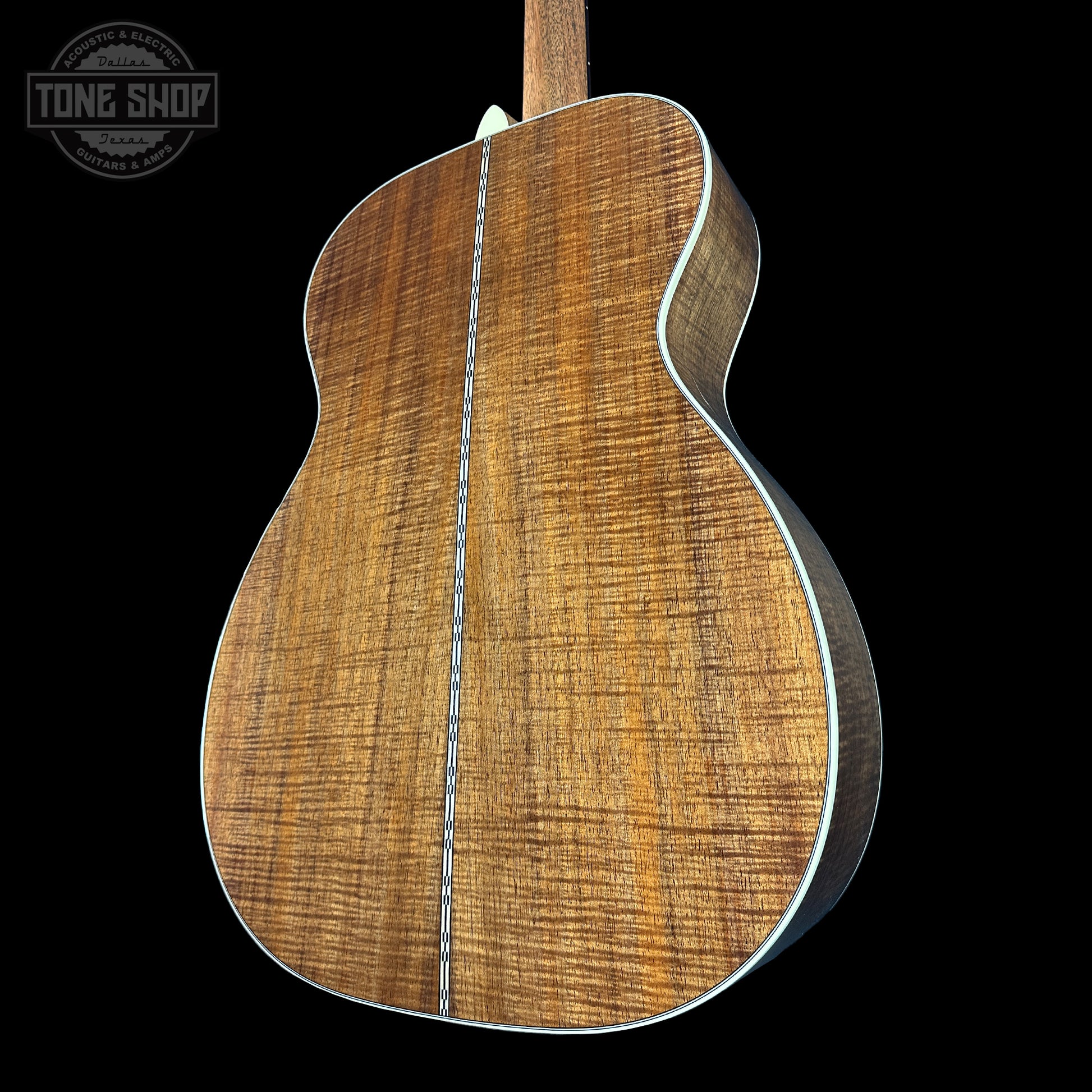 Back angle of Martin Custom Shop 00-14F 28 Style Italian Alpine Spruce/Tasmanian Blackwood.