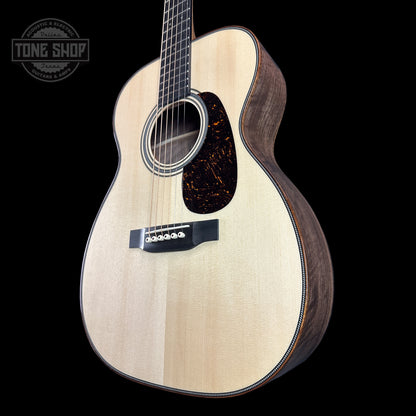 Front angle of Martin Custom Shop 28 Style 00-14F Italian Alpine Spruce/Exceptionally Figured Black Walnut.