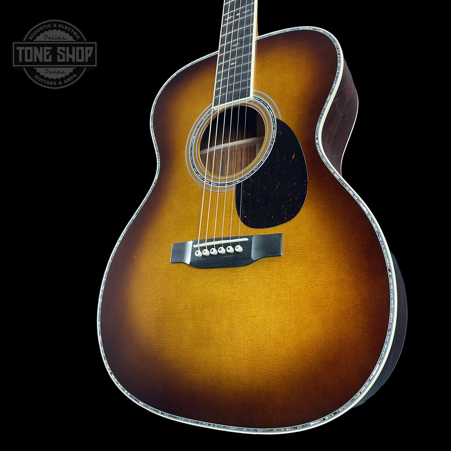 Front angle of Martin Custom Shop OM-41 Ambertone Torch Motif Carpathian Spruce/Cocobolo.